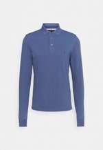 Polo longues manches Tommy Hilfiger