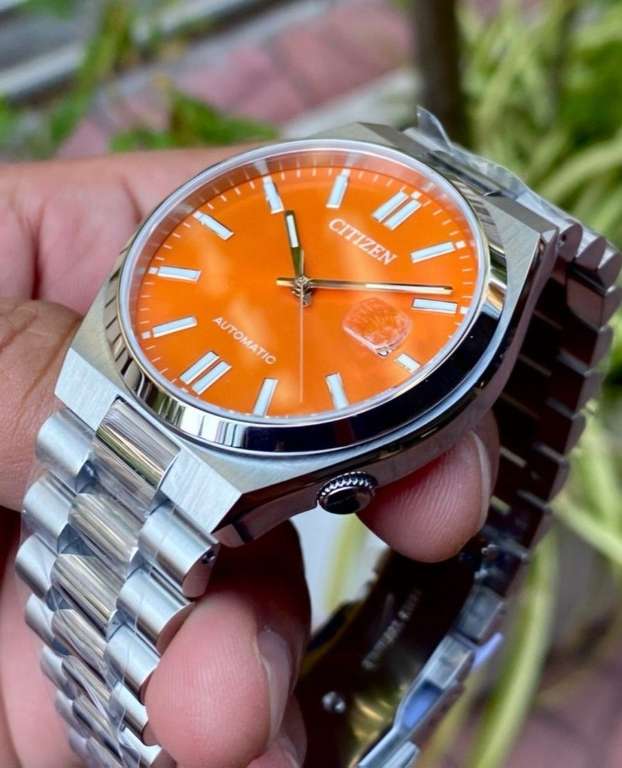 Montre Citizen Tsuyosa Magu automatique cadran orange bracelet acier 40 mm